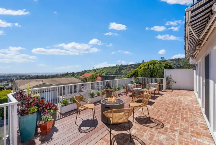 Gather around the fire pit and enjoy stunning hillside views at this beautiful Airbnb retreat!