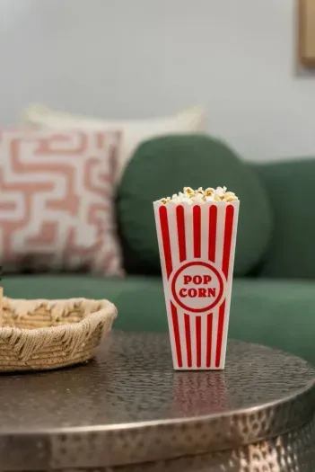 Movie night essentials! ✨ Cozy up and enjoy a cinematic experience in this stylish Airbnb.