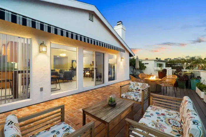 Relax and unwind on this charming patio with sunset views!
