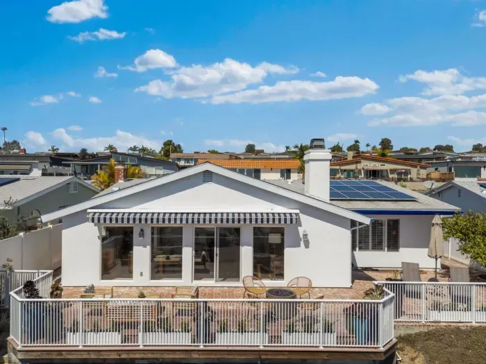 A backyard retreat with water views and modern charm!