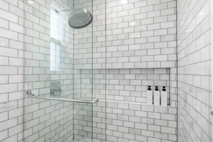 Shower with sliding glass door