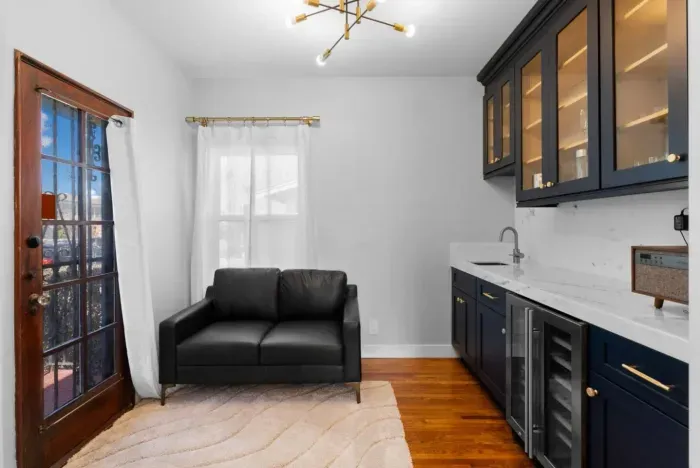 The parlor located off of the grand living room