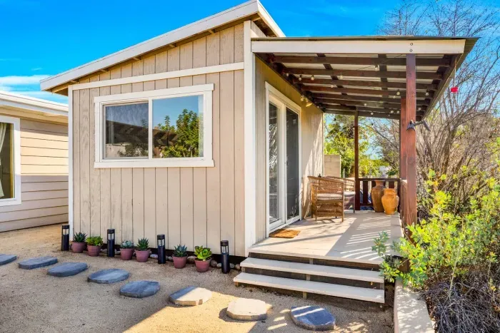 A sweet cottage-style entry that feels warm and welcoming the moment you arrive.