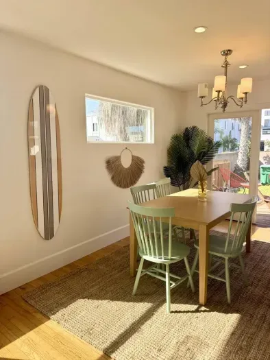 A bright dining space perfect for gathering after a day in the sun.