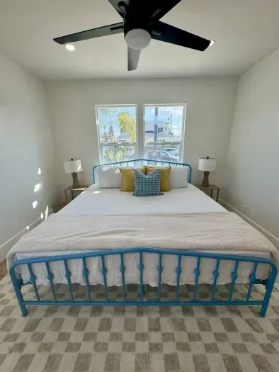 Wake up to palm tree views and soft coastal light.