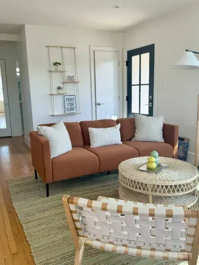 A cozy, sunlit living space designed for easy relaxation.