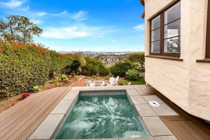 Kick back in this inviting spa with sweeping city views. Bubbles, sunsets, and bliss — all in one soak.