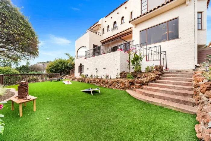 Morning sun lights up the garden and lawn — a perfect space to relax or play.