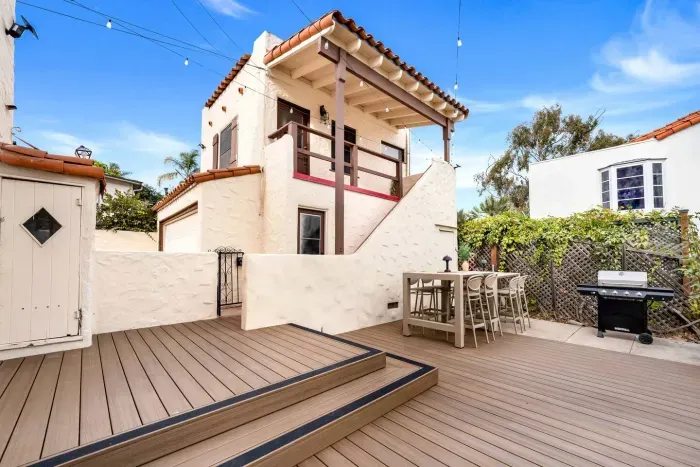 A sunlit deck made for slow mornings and breezy evenings, blending coastal calm with elegant design.