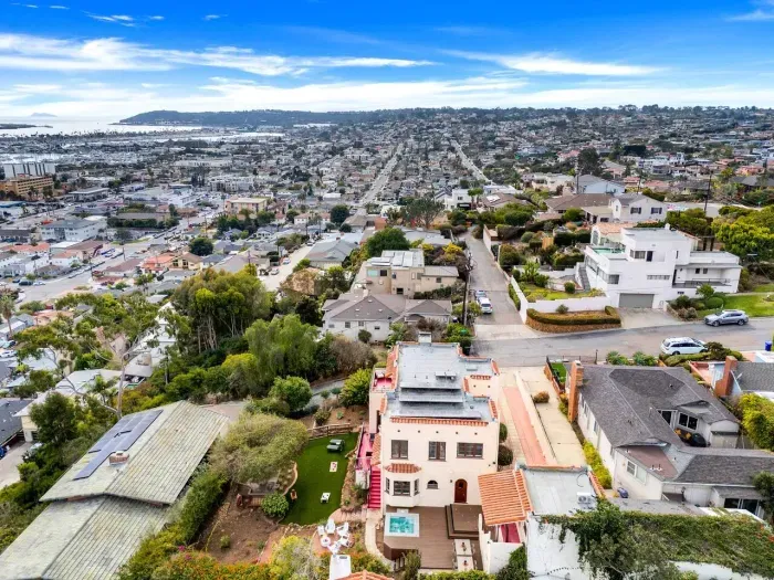 A stunning aerial of your home-away-from-home — elegant design meets family comfort in this unforgettable stay.