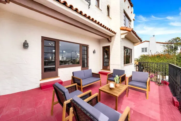 Lounge under the glow of the setting sun, surrounded by comfort and conversation-ready spaces.