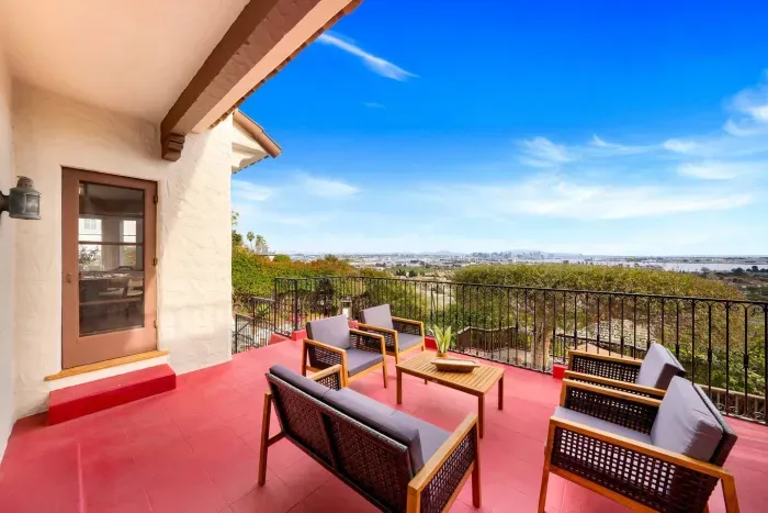 A sunlit patio built for coffee, laughter, and sweeping coastal air.