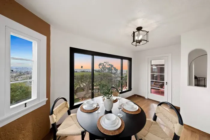 Golden hour dining beside panoramic views.