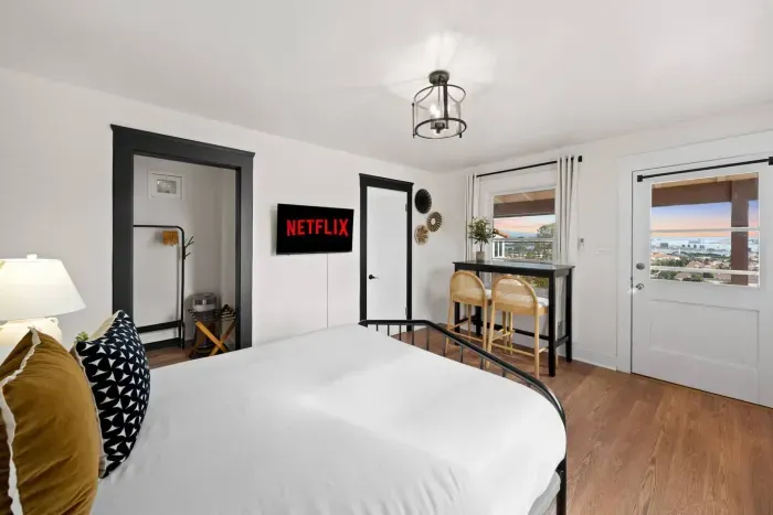 Stream your favorite shows from bed while watching the sunset beyond the window.