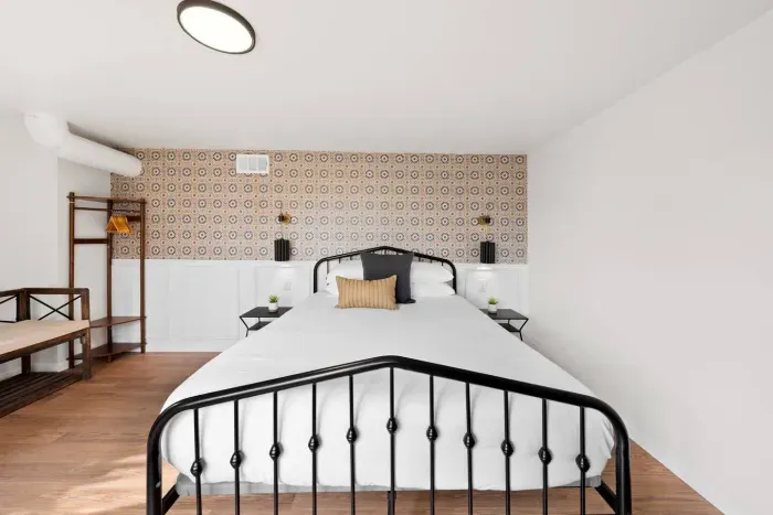 Rest easy in this peaceful, light-filled bedroom retreat.