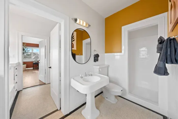 Retro flair meets fresh design in this cheerful bathroom.