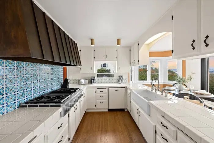 Kitchen with pro-grade appliances and coastal-inspired design.