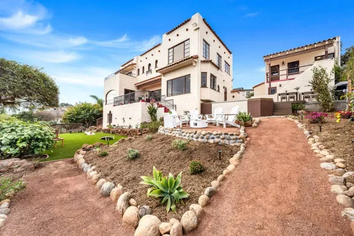 Your private villa glows under the sun, surrounded by lush gardens and ocean air.