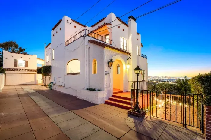 Evening paints the home in soft pastels; step onto the terrace and breathe it all in.