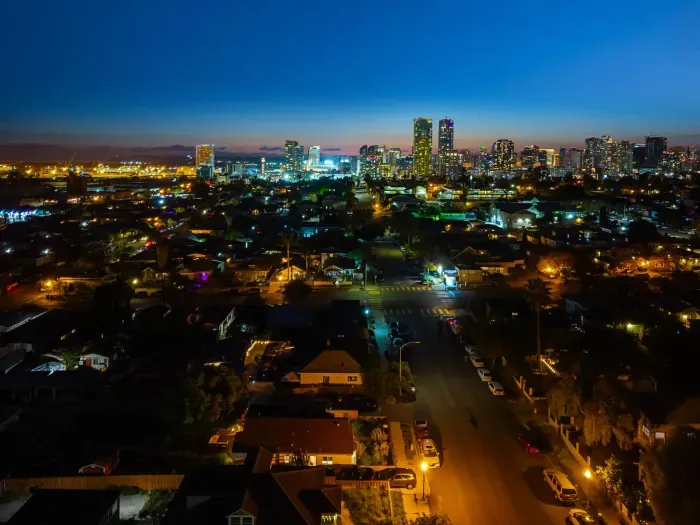Dusk skyline views near downtown—quiet neighborhood, city at your door.
