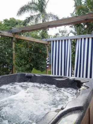 Cottage with Putting Green, Hot Tub, & Garden