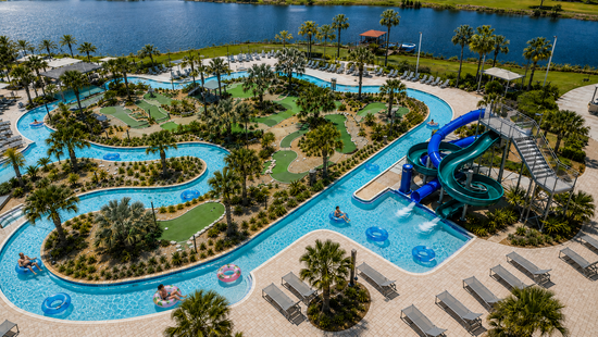 Aerial view of Storey Lake Resort lazy river, water slides and mini golf beside the lake
