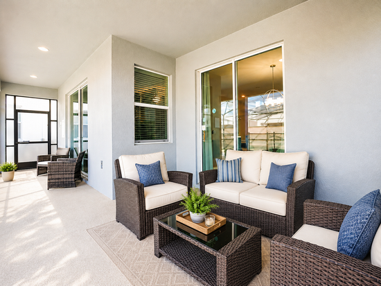 Covered screened lanai with outdoor seating