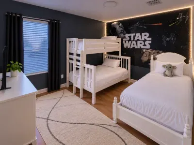 Star Wars-themed kids’ room with bunk beds and cozy modern style