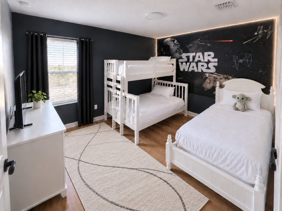 Star Wars themed kids bedroom with two twin beds